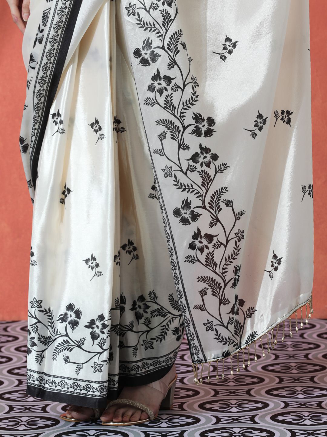 White & Black Floral Satin Saree – Embellished Border – Beads and Stones