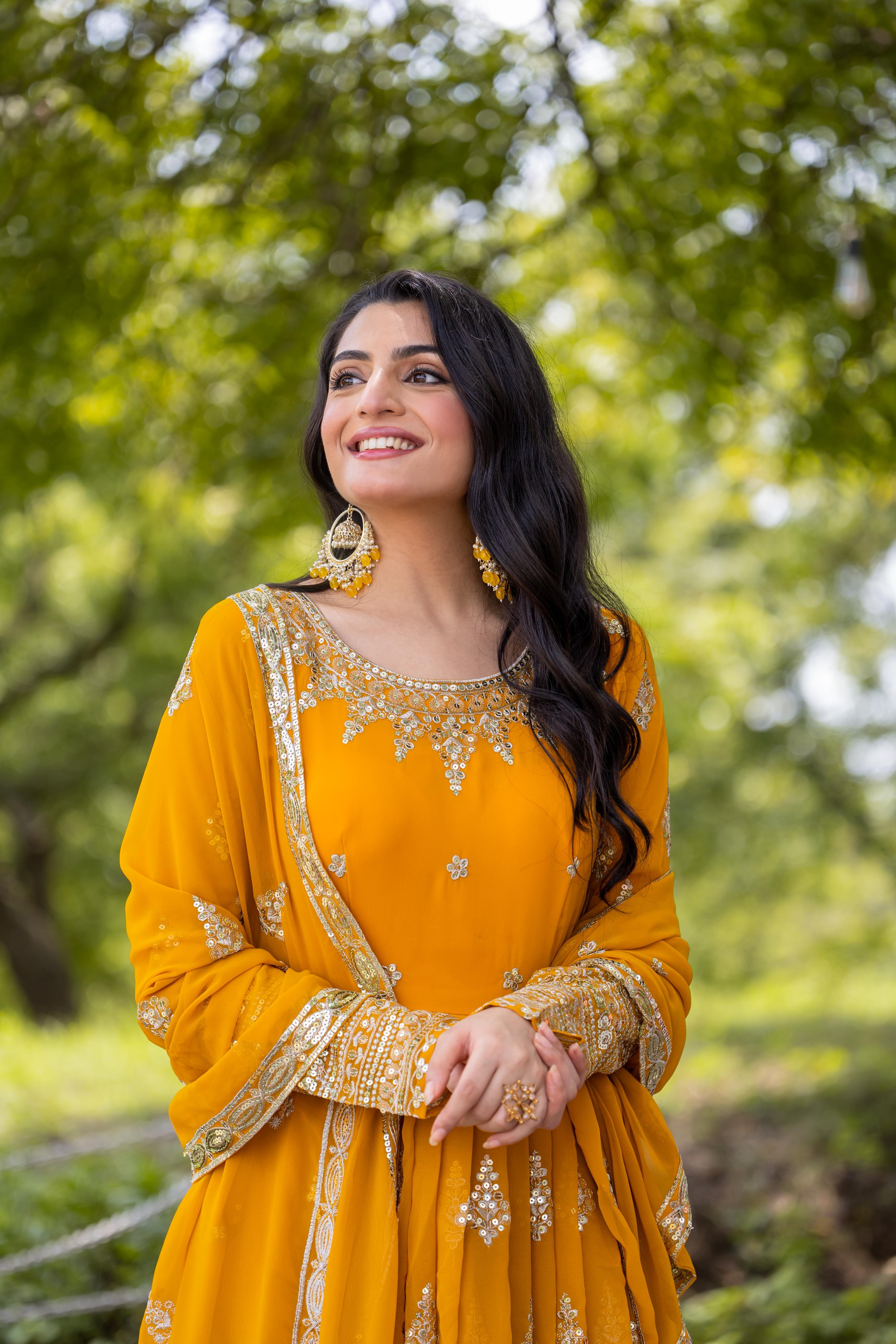 Yellow Flared Faux Georgette Gown – Round Neck – Heavy Sequin Embroidery
