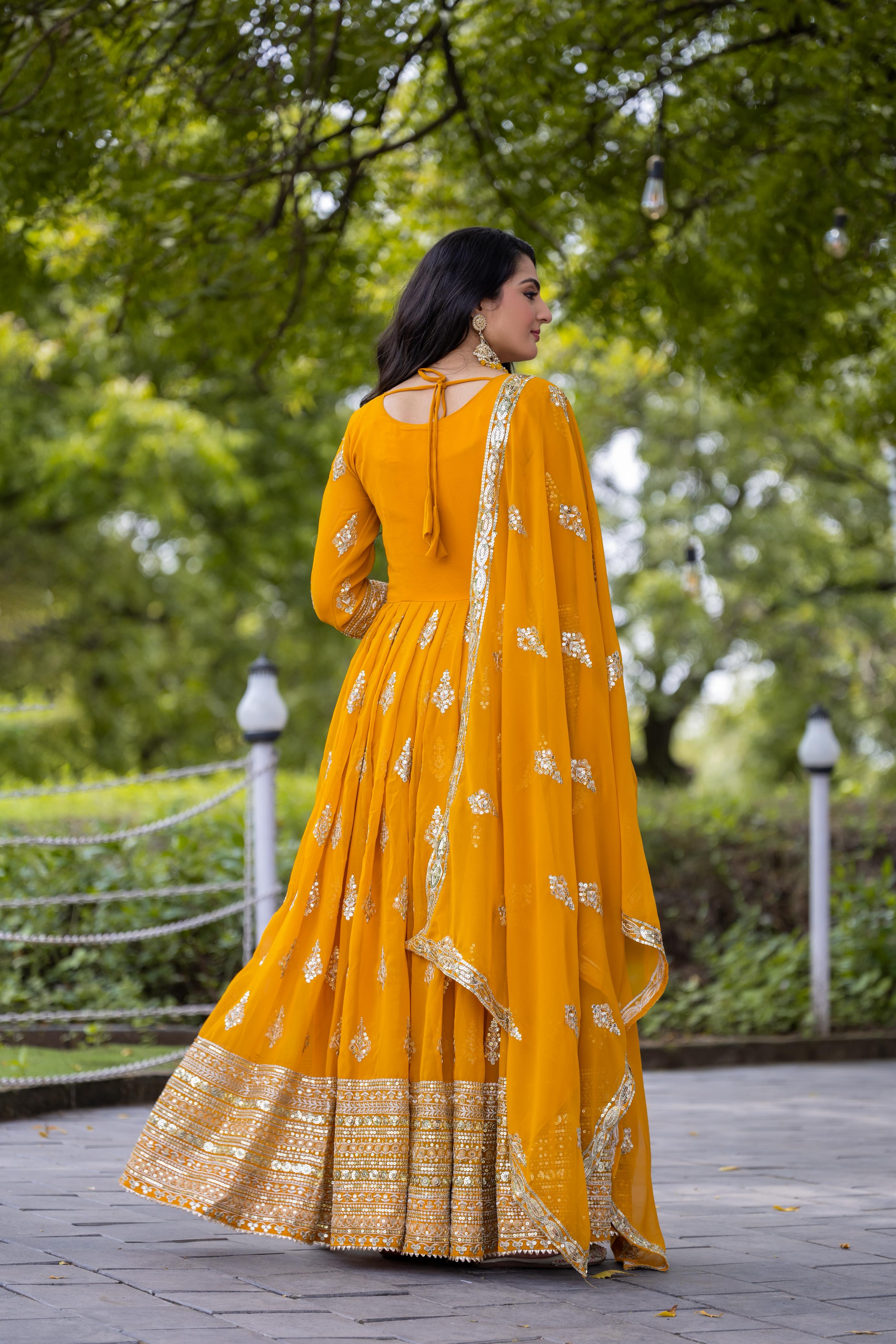 Yellow Flared Faux Georgette Gown – Round Neck – Heavy Sequin Embroidery